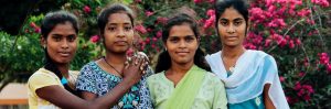 Four girls posing together.