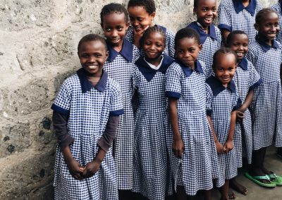 A group of smiling and laughing girls.