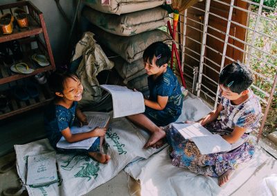 Three girls studying together.