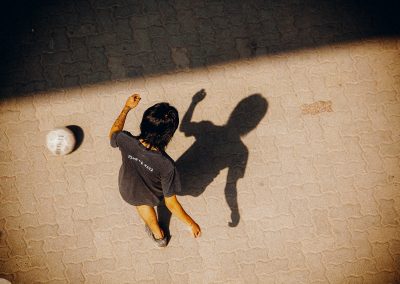 A child playing soccer